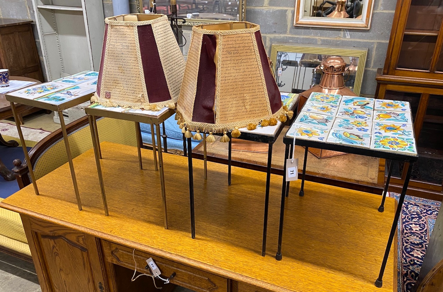 A set of four mid century rectangular tile top occasional tables, largest length 45cm, depth 34cm, height 46cm